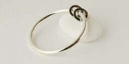 Silver tube bangle with 2 Oxidised Discs