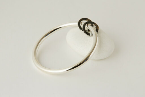 Silver tube bangle with 2 Oxidised Discs