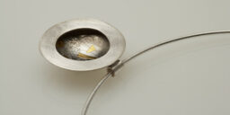 Textured Silver Pendant with Gold Decoration