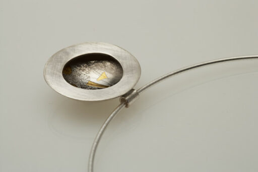Textured Silver Pendant with Gold Decoration
