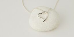 Heart and snake pendant