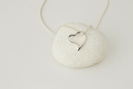 Heart and snake pendant