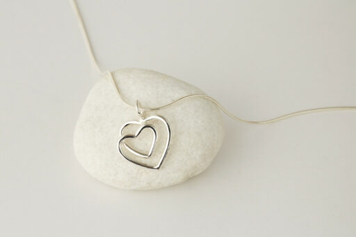 Double heart and snake chain pendant